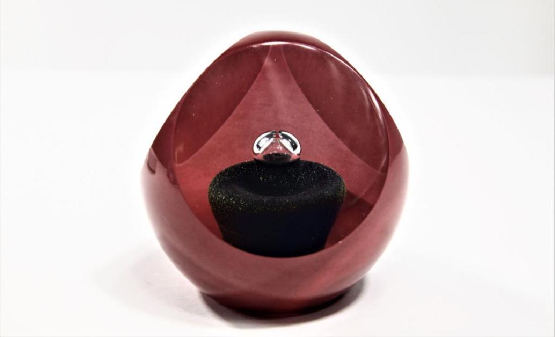 Correia plum-colored paperweight (1 of 3)