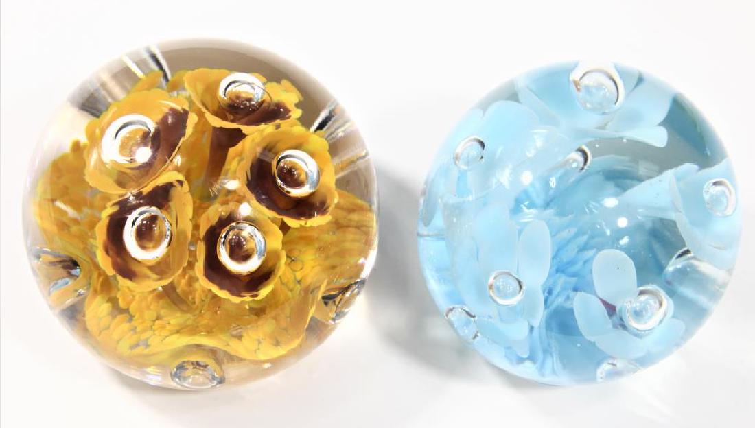 Two (2) signed paperweights (1 of 4)