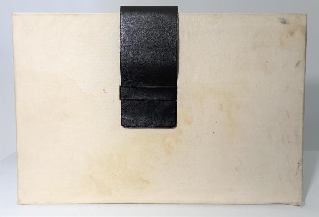 Jack Levine & James Michener Sketchbook: Facing East Limited edition leather portfolio hand signed by "Jack Levine (1915 - 2010) / James A. Michener 1907-1997)" New York: Maecenas, 1970. Tall folio, signatures loose as issued in silk portfol
