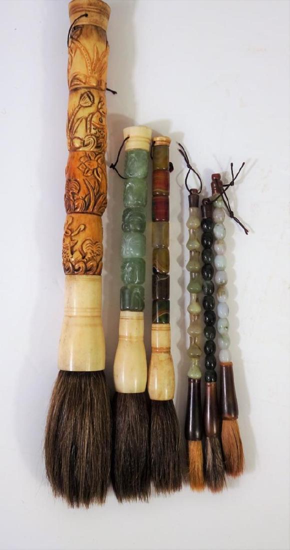 6 Carved Jade & Stone Calligraphy Brushes: 6 Carved Jade & Stone Calligraphy Brushes. 1- Carved bone brush,15 inches long 2- Carved jade and bone brush,12 inches long 3- Carved agate-style brush,11 inches long 3- Carved stone brushes, 9.5 inch