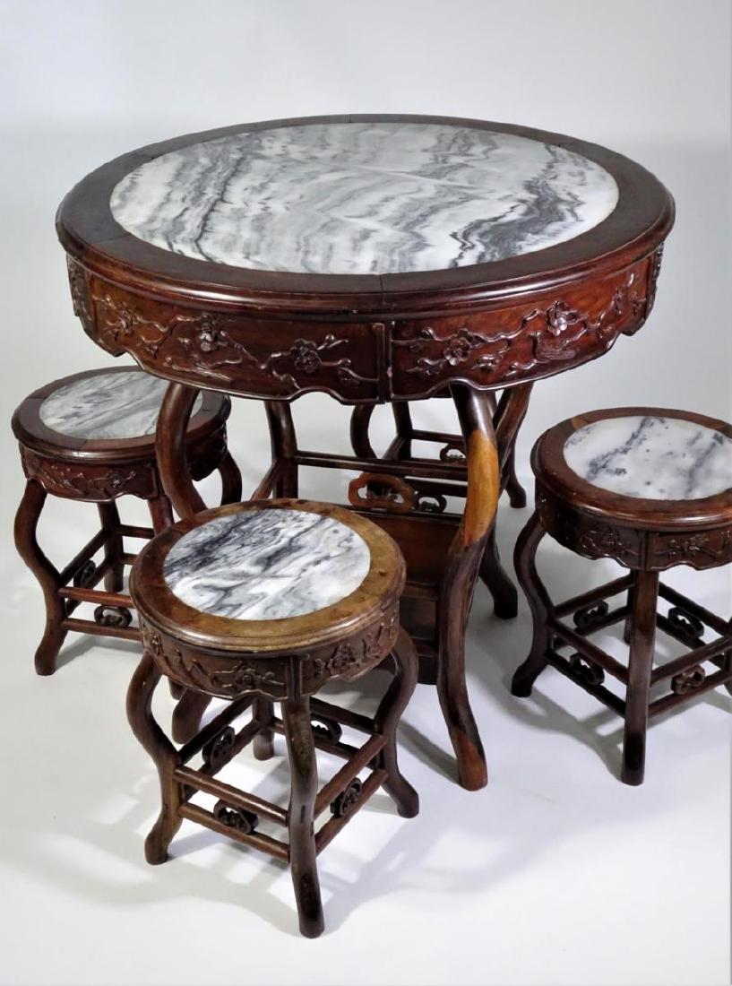 Chinese Rosewood Marble Top Table w Four Stools: 1 Table and 4 Stools: Table sizes: Height - 31 1/2 in. Diameter - 32 1/2 in. Stool Sizes: Height - 17 1/2 in. Diameter - 13 1/2 in.