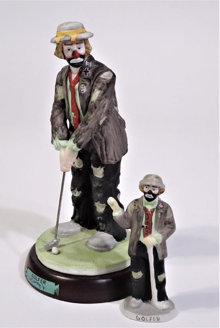 Emmett Kelley Golf Clown Statues: This lot consists of two statues of Emmett Kelley, a world famous American clown and circus performer who usually was sad-faced and wore a hobo costume. The statues are part of the Emmett Kelley Jr. C