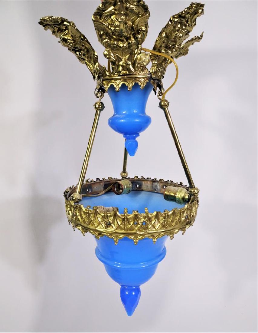 Antique French Blue Opaline Glass Hall Lantern: Antique French Blue Opaline Glass Hall Lantern ft. repousse gilded mounts. c. 1850. Good with wear, consistent with age and use. Size: 24 x 9 1/2 in.
