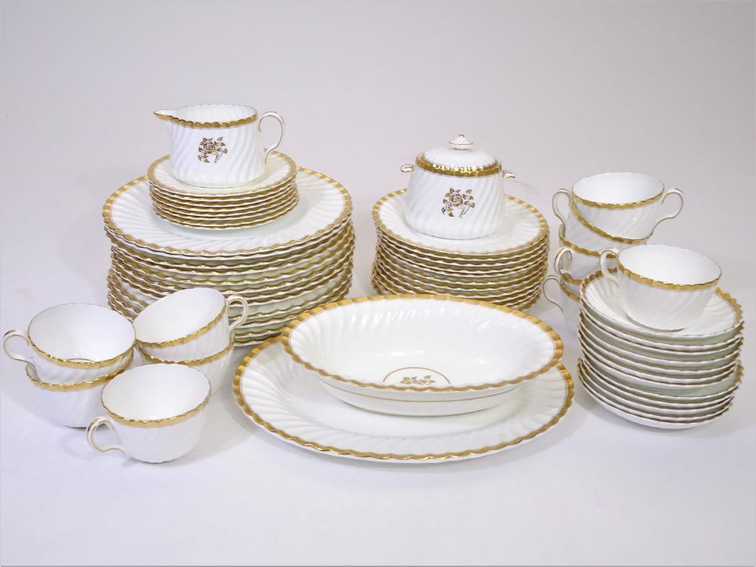 Exquisite 60 Piece Minton Gold Rose Dinnerware Set: This lot consists of 60 pieces of Minton dinnerware in a Gold Rose pattern, probably from the mid 1940’s. The pieces are marked “Minton, Made in England H4680” on the base and all the pieces hav