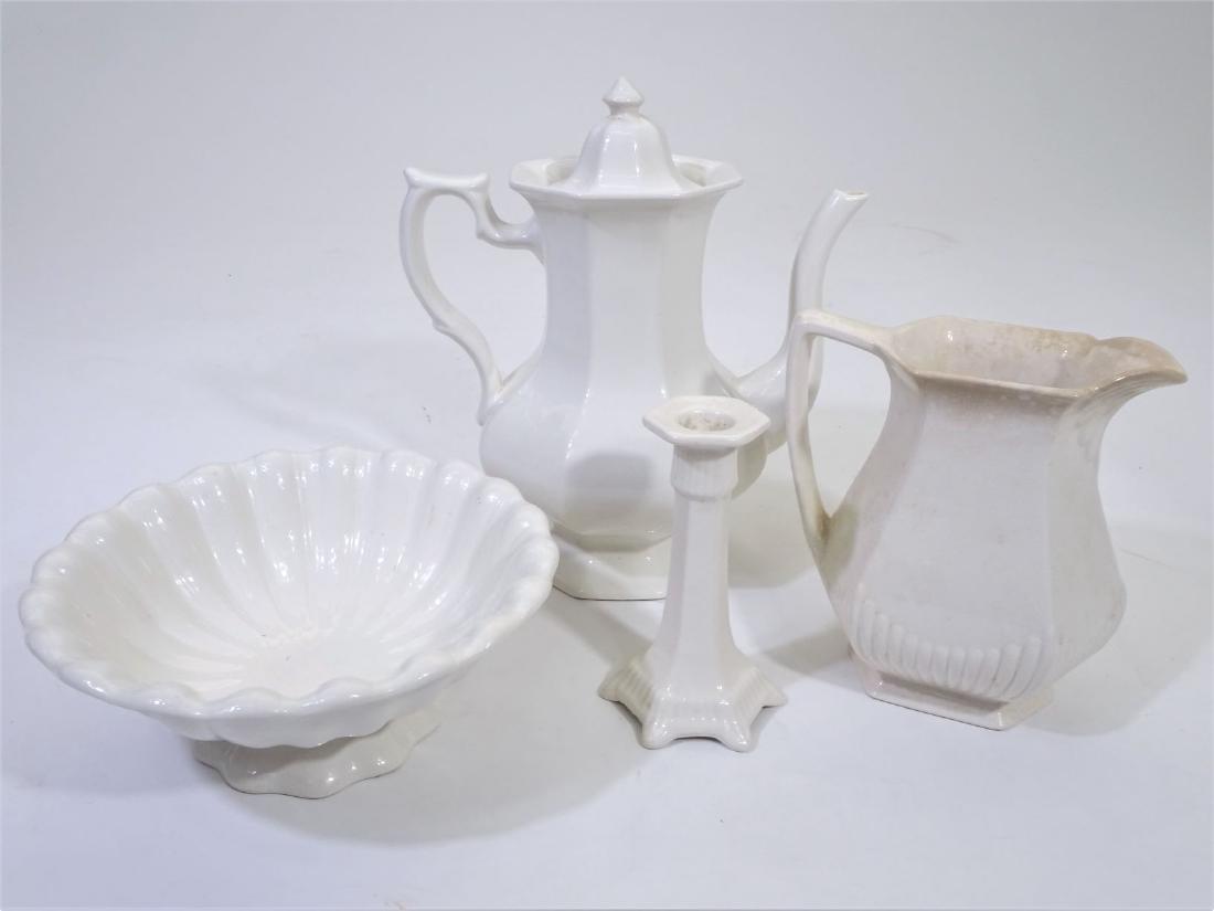 Four (4) Pieces of White Ironstone Pieces: This lot consists of four pieces of White Ironstone, probably from the late 1800’s or early 1900’s. The largest piece is a coffee pot with a lid; the coffee pot is marked “Real English Ironstone