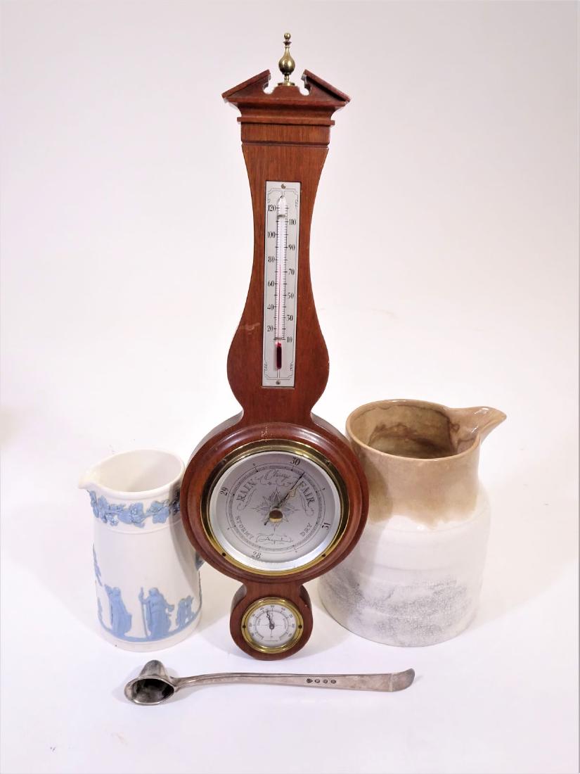 Wedgwood, Nelson Pottery, CandleSnuffer, Barometer: This lot consists of a Wedgwood pitcher marked “C F Etruria & Bartlaston, Embossed Queen’s Ware”, a pitcher from the Lord Nelson Pottery, a vintage candle snuffer by Gerity, and a mahogany barom