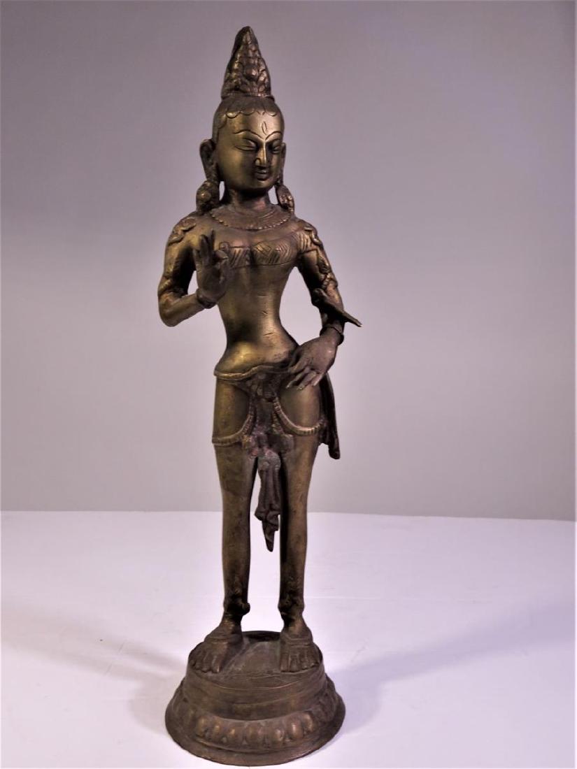Indonesian Brass Figure with Bird: Size: 5 x 4 1/2 x 17 in.