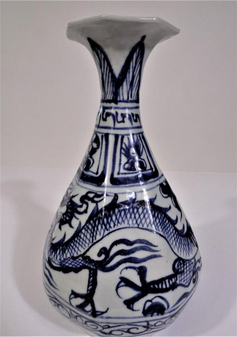 Chinese Tall Blue & White Dragon Vase: Size: 10 x 5 1/4 in. Please contact Eamon at Premier Shipping and Crating for a quote to pack and ship at 941-358-9999 or email at info@premiershipment.com