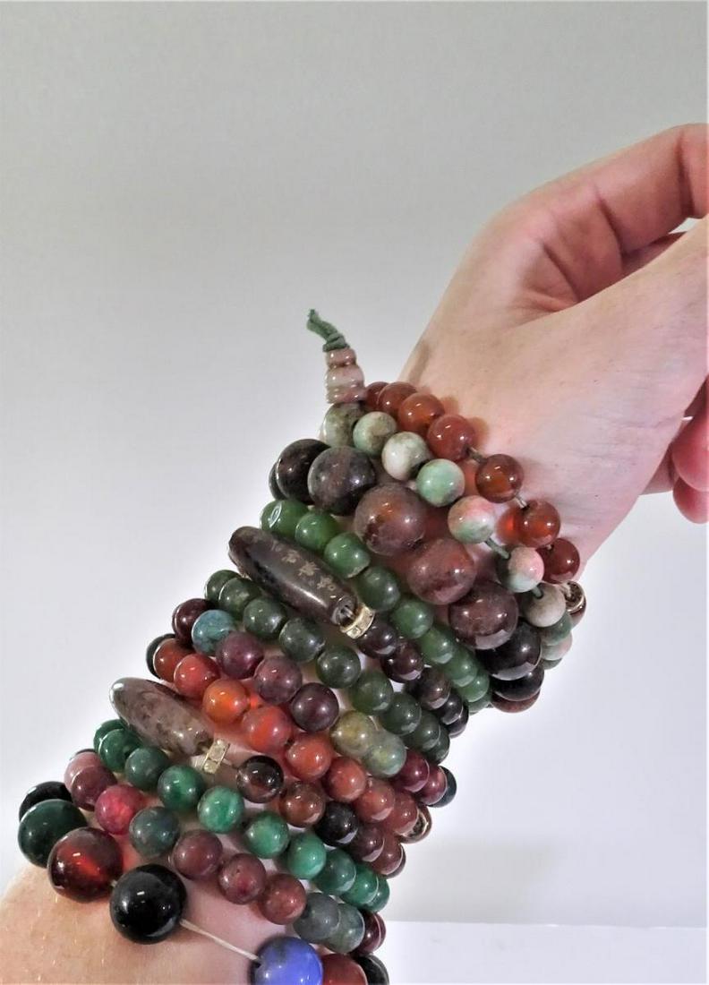 (12) Multi-Colored Beaded Bracelets: All around 3 in. Please contact Eamon at Premier Shipping and Crating for a quote to pack and ship at 941-358-9999 or email at info@premiershipment.com