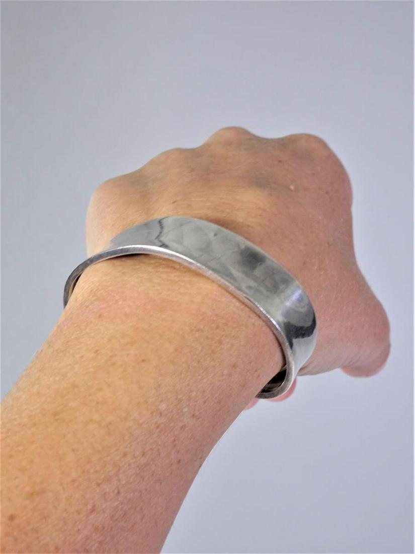 Sterling Silver Mexico 925 C 11 Cuff: Size: 3” w x .5” h Marked Mexico C11 925 on inside rim Please contact Eamon at Premier Shipping and Crating for a quote to pack and ship at 941-358-9999 or email at info@premiershipment.com