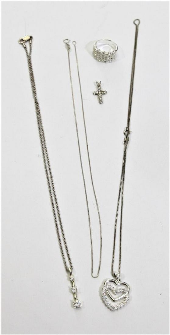 (4) Pieces Sterling Jewelry: Three Necklaces with Pendants and One ring size 7. Please contact Eamon at Premier Shipping and Crating for a quote to pack and ship at 941-358-9999 or email at info@premiershipment.com