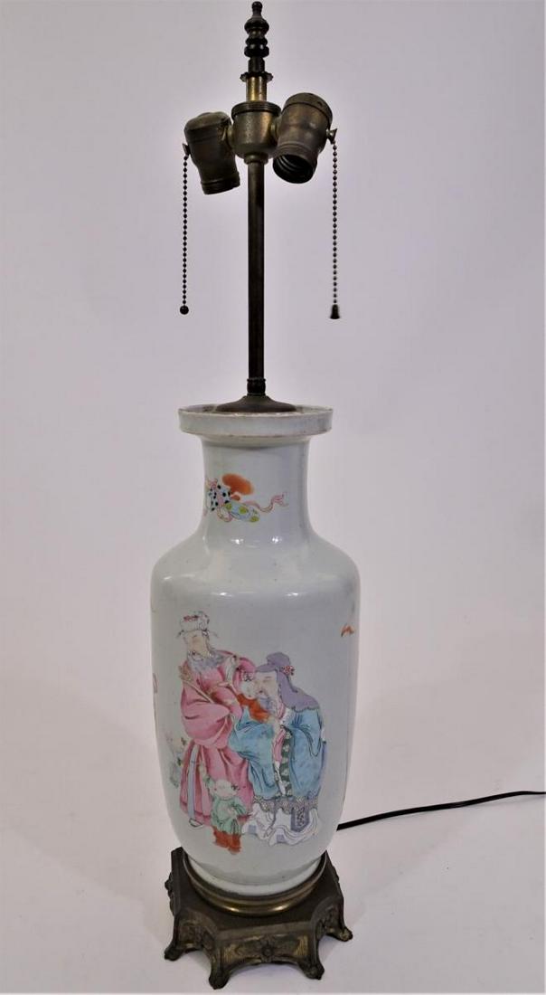 20th C. Chinese Style Roleaux Lamp: 20th C. Chinese Style Roleaux Lamp with metal mounts. Size: 30 1/2 x 7 in. Please contact Eamon at Premier Shipping and Crating for a quote to pack and ship at 941-358-9999 or email at info@premiershi