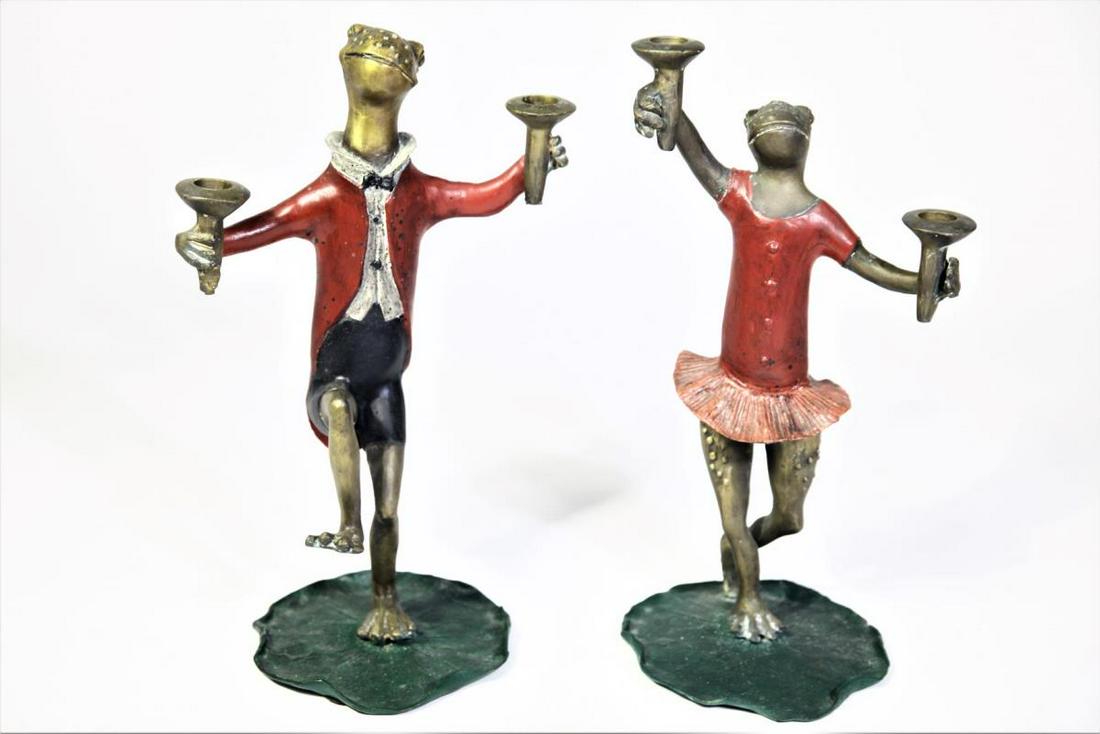 Pair of Bronze Hand painted Candlestick holders: Hand Painted in shape of frogs. Male: 15 1/2 x 9 in. Female: 16 x 8 in. Please contact Eamon at Premier Shipping and Crating for a quote to pack and ship at 941-358-9999 or email at info@premiershipme