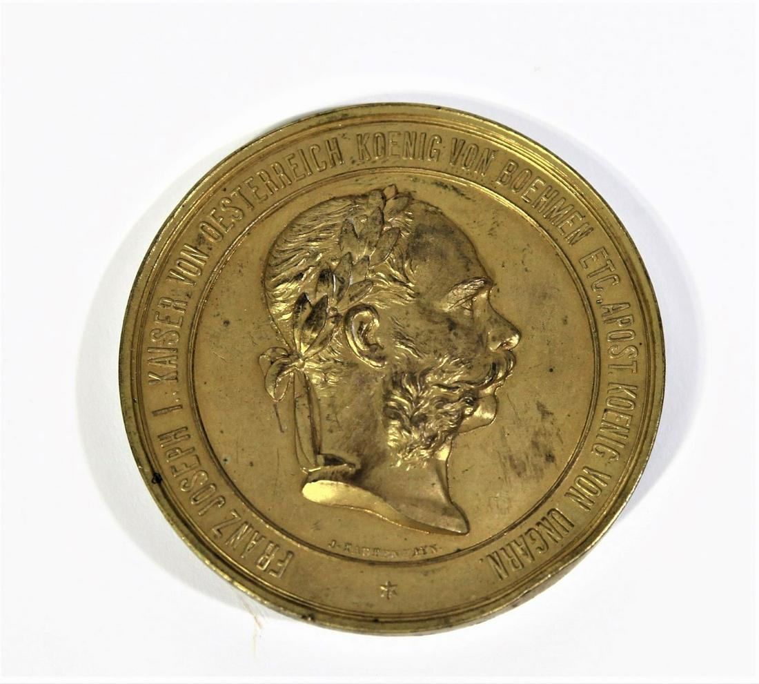 1873 Gilded Bronze Austrian Medal, Franz Joseph I: This is a gilded bronze medal featuring the bust of Franz Joseph I, Emperor of Austria and King of Bohemia and Hungary. The medal was designed by J Tautenhayn to commemorate the World's Exposition hel