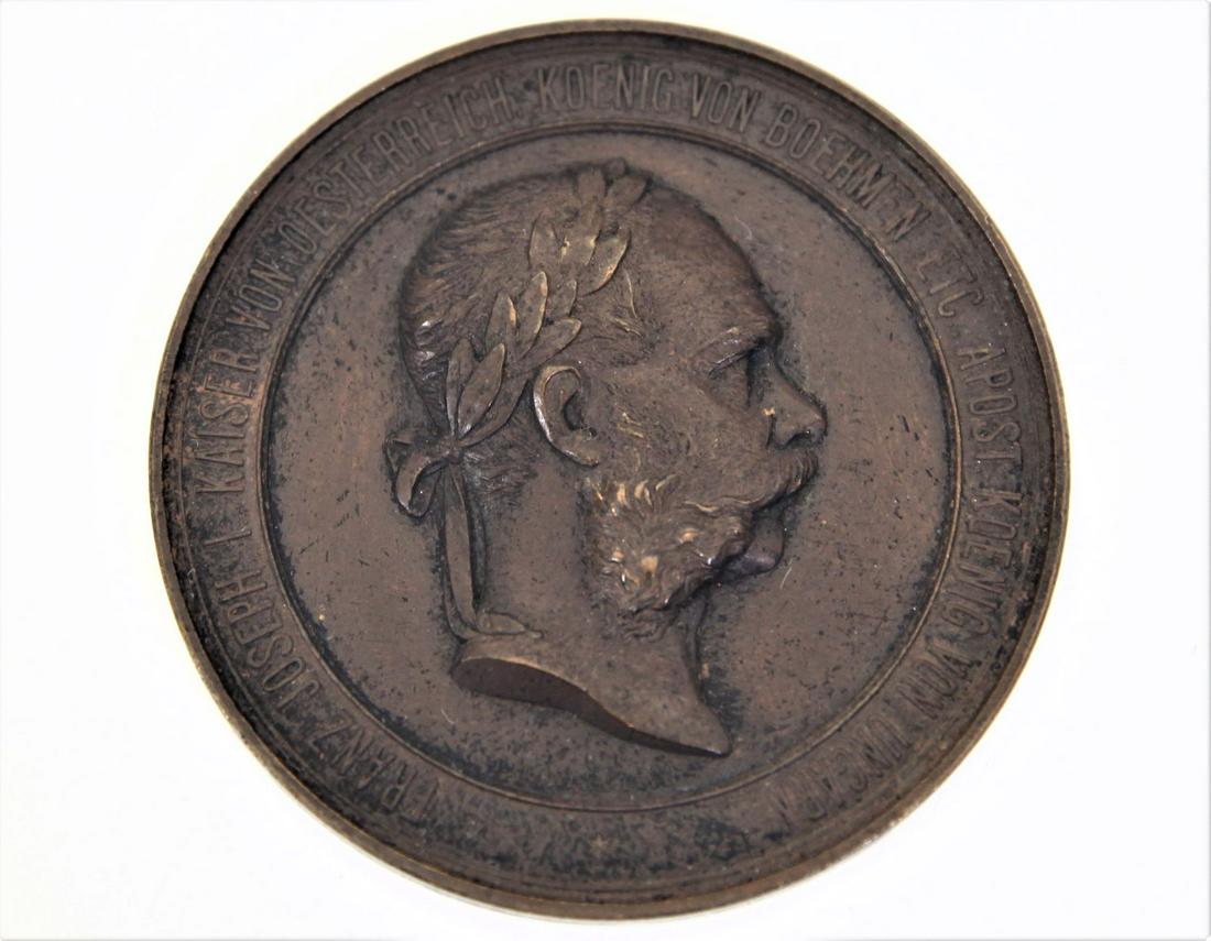 1873 Austrian Bronze Medal, Franz Joseph I: This is a bronze medal featuring the bust of Franz Joseph I, Emperor of Austria and King of Bohemia and Hungary. The medal was designed by J Tautenhayn to commemorate the World's Exposition held in Vi