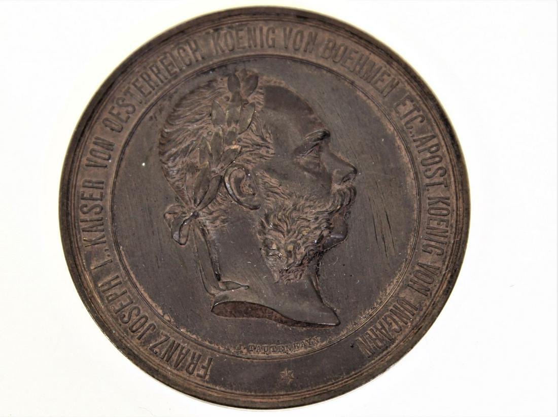 1873 Austrian Bronze Medal, Franz Joseph I: This is another bronze medal featuring the bust of Franz Joseph I, Emperor of Austria. The medal was again designed by J Tautenhayn to commemorate the World's Exposition held in Vienna in 1873, but th