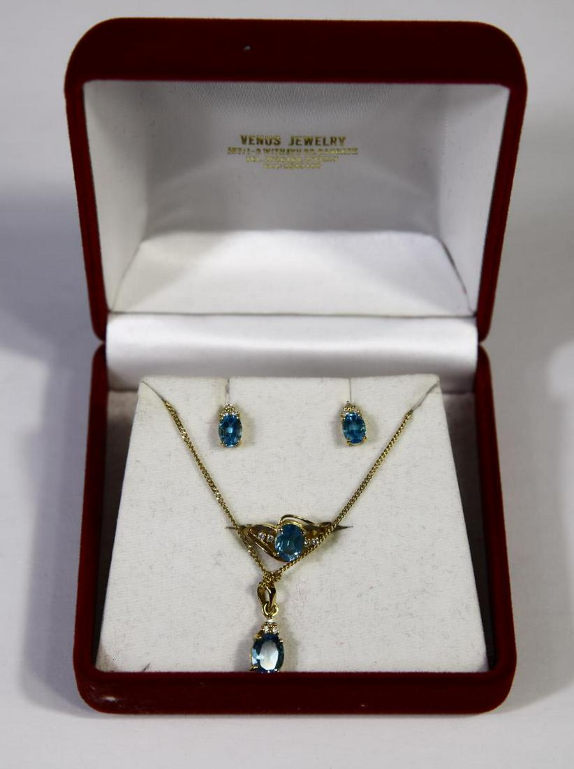 14k Blue Topaz & Diamond Set: Ring size: 5-6 Pendant necklace Earnings (no backs) Total weight 10g Purchased in Bankok,Thailand at Venus Jewelry