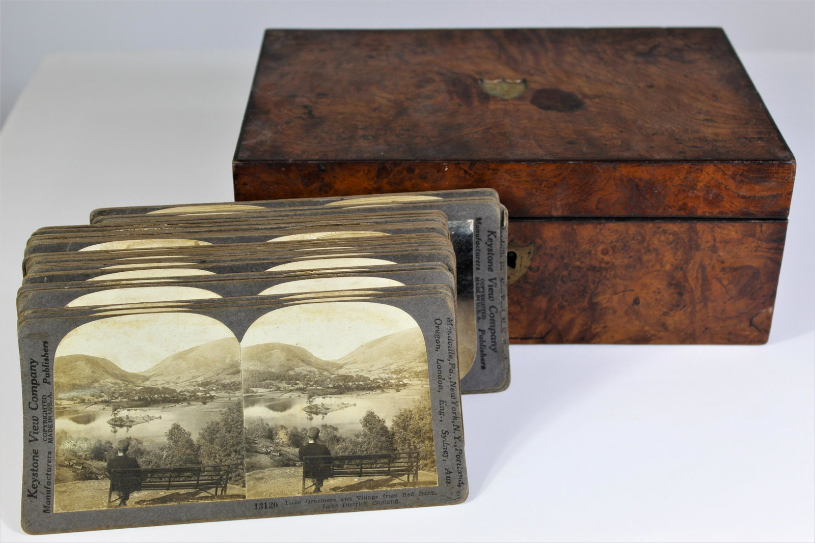 Burlwood Box & WWI Stereo View Cards: These are 36 stereo view cards from the early 1900's. About half show scenes from World War I, including, tanks, artillery fire, Zeppelins over Germany, and more. They were all made by Keystone and ar