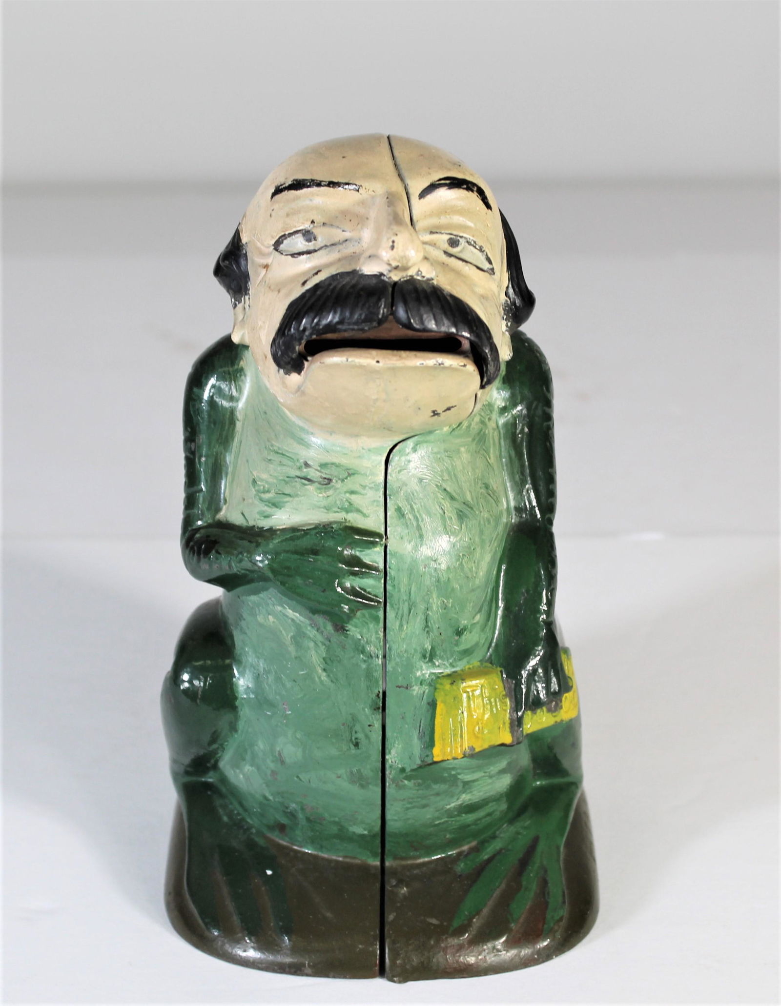 General Butler Cast Iron Still Bank: A historically significant bank produced by J. & E. Stevens of Cromwell, Connecticut circa 1884. It depicts "Spoons" Butler an inept Union General during the Civil War. Butler was known for his lootin