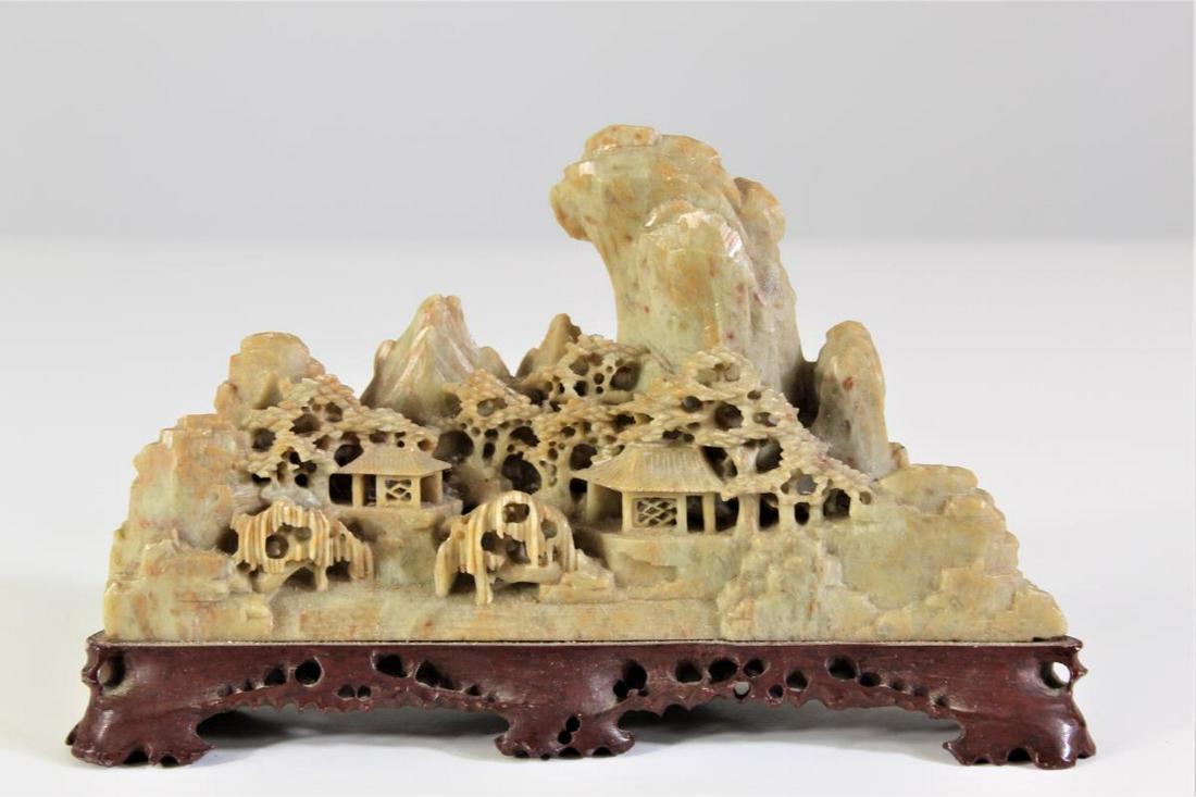 Intricate Soapstone Carving: on carved soapstone stand. Under 5 in.