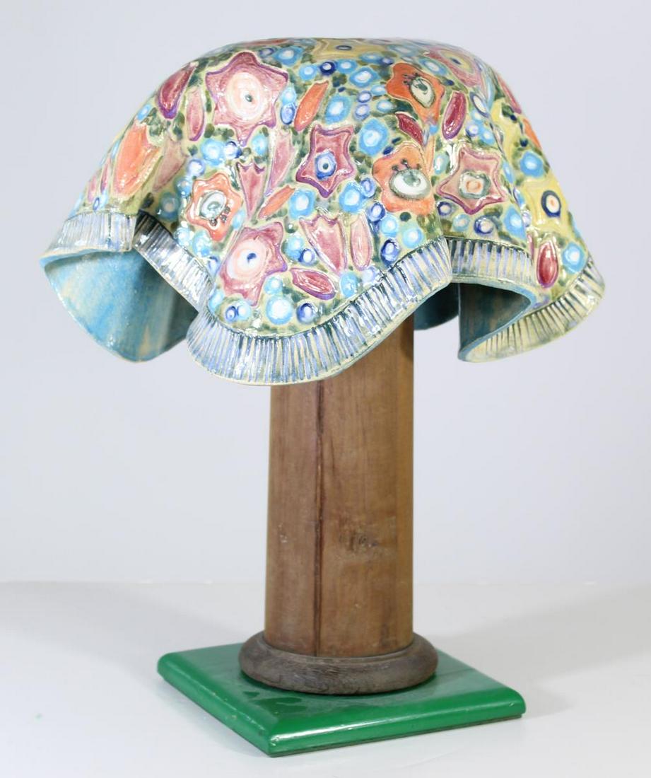 Hand Painted Mushroom Shape Garden Stool: Size: 17 1/2 in. H x 13 x 13 in. Size of base: 7 1/2 x 7 1/2 in. This a cute little garden stool shaped as a mushroom. It is hand painted with an abstract flower design and a plethora of colors. It ha