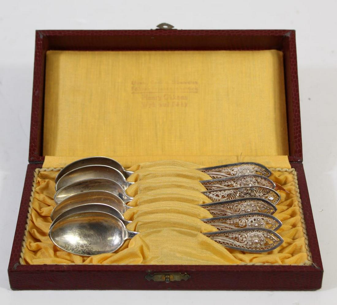 Set of Russian Filigree Spoons: This is a cased set of six Russian filigree spoons in .800 silver. Case is 7 x 3 3/4 x 1 5/8 in. deep.