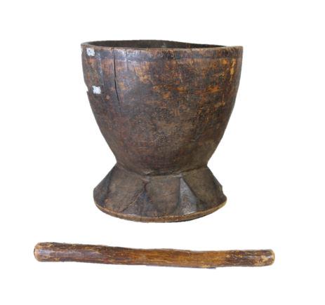African Mortar and Mortar Stick from 1900's: This large mortar bowl and mortar stick from the Central African Republic were hand-carved and used in daily life to mix and beat grains, grind wheat, and even make peanut butter. The bowl is made fro