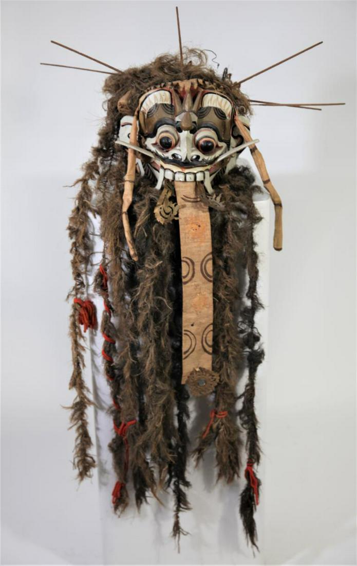 Elaborate Indonesian Spirit Mask: Headdress is made with human hair. Length: Around 46 in.