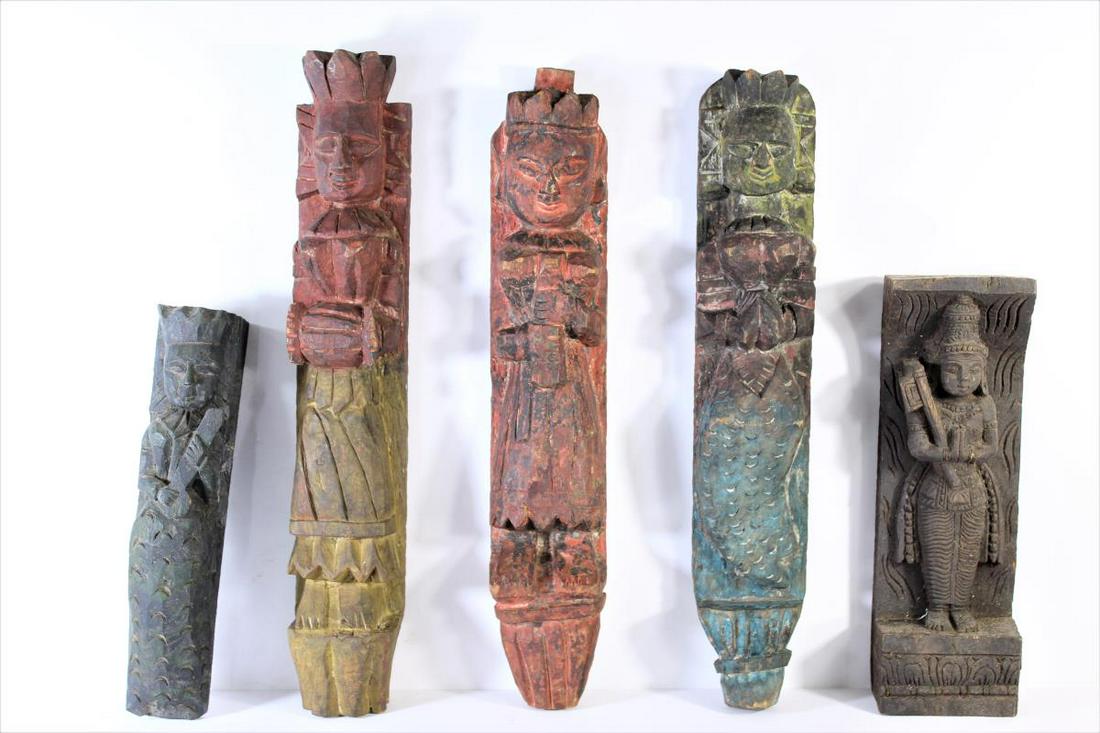 Group of 5 Indonesian Wall Carvings: Carved Wood. Sizes: 16 1/4 x 3 x 2 in. 16 1/2 x 3 x 2 in. 11 in. 3 5/8 x 2 1/4 in. 10 1/4 x 2 x 3 in.