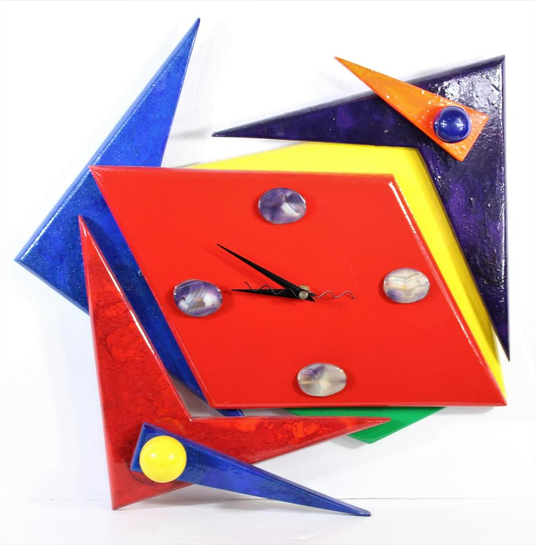 20th Century Signed Abstract Modern Clock: Modern wall clock with signed initials on the back. Vibrant colors. Unknown if working condition. Size: 16 1/2 x 17 in.