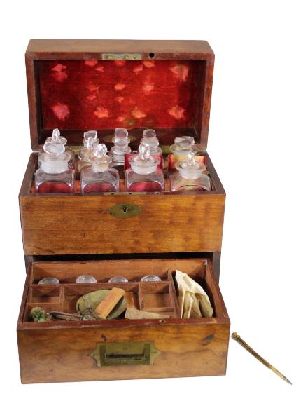 Early 19th C. Apothecary Chest by John Bell: This is an early 19th century apothecary chest by John Bell. It's a portable doctors' medicine chest, complete with 16 bottles and a scale. Brass bound mahogony case. Overall: 9 1/4 in. L x 5 1/2 in.
