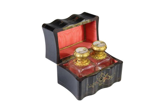 French Black Lacquer Box w/ Perfume Bottles: Contains two painted and gilt covered perfume bottles circa 1860. Measurement: 3 1/2 x 4 1/2 in.