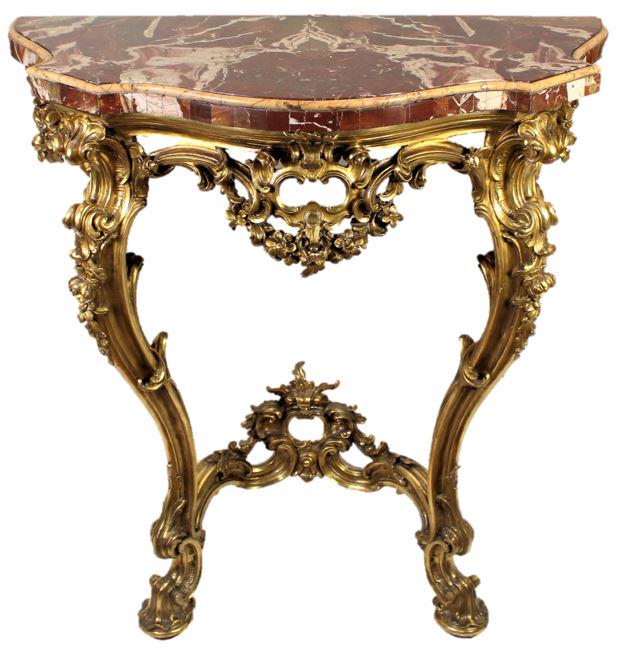 Serpentine Marble Top Gilded Console Table: Carved and pierced gilded console table with conforming serpentine marble top. Measurements: 36 1/2 x 35 in.