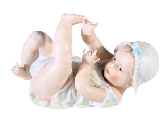 Victorian Era, "Piano Baby": A turn of the century, Victorian era, “Piano Baby” Measurements: 5 1/2 x 8 1/2 in.