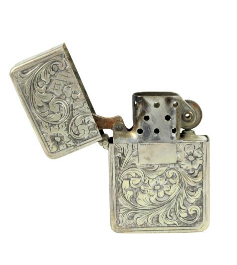Italian Silver Zippo Lighter: Size: 1 1/2 in wideCase has matching numbers on interior and weighs 0.910 ozt. Carved with floral design. Please note that all sales are final and no refunds will be given under any circumstances. Sar