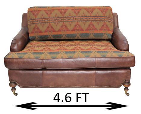 Southwestern Upholstered Leather Loveseat: Southwestern upholstered leather loveseat, Includes hide-away bed, front legs on casters. Measurements: 55 x 45 x 30 in. Please note that all sales are final and no refunds will be given under any cir
