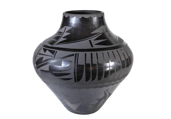 Carmelita Dunlap (1925-1999) Ildefonso Blackware: Black on black design from Ildefonso Pueblo. Carmelita Dunlap was raised by her aunts Desideria Montoya and Maria Martinez after her mother died. As those aunts were in the heart of the pottery-making