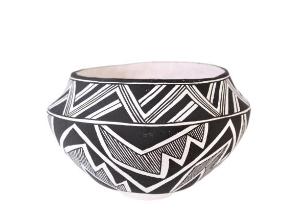 Lucy M. Lewis (1898-1992) Acoma Pottery Jar: Black-on-white Southwestern Acoma pottery bowl, signed by the artist on the underside. Lucy Martin Lewis was a Native American master potter from Acoma Pueblo, New Mexico. She is known for her black-o