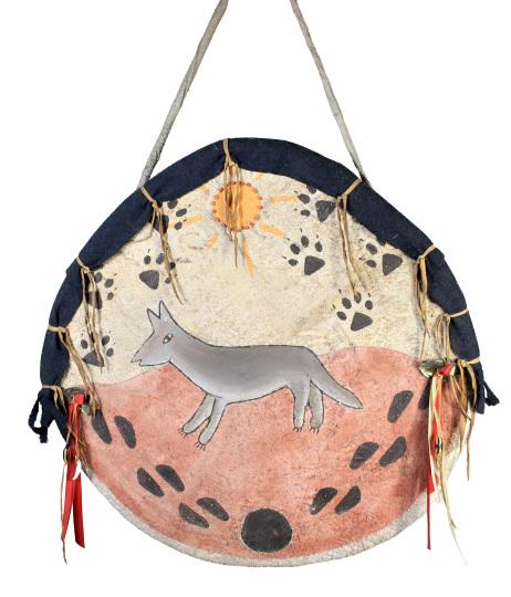 Native American & Southwestern Hide Shield: Painted hide shield with coyote on front, and grip for holding on reverse.Size: 21 x 20 1/2 in.Please note that all sales are final and no refunds will be given under any circumstances. Sarasota Estat