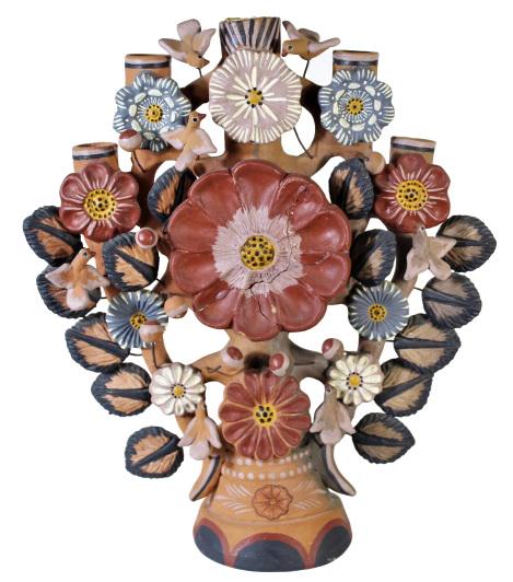 Hand Painted Mexican Clay Candelabra: Flowers, birds, and leaves. As is. Approx 15 1/2 in tall. Please note that all sales are final and no refunds will be given under any circumstances. Sarasota Estate Auction provides condition reports 