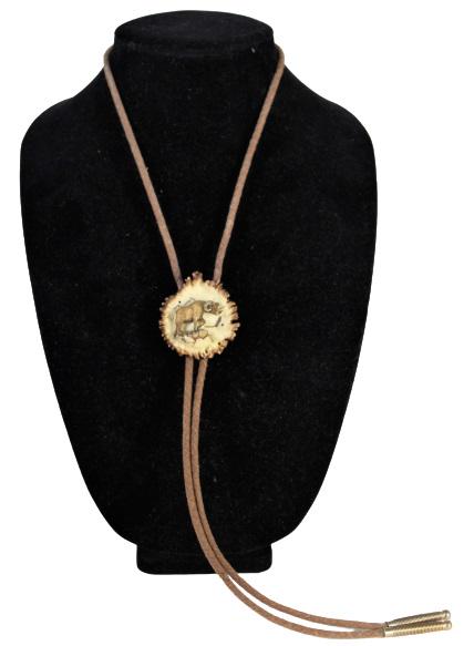 Southwestern Antique Horn Bolo Tie: Ornamental clasp depicts a bighorn, made of antler. Signed on back.Size: 20 1/2 in longPlease note that all sales are final and no refunds will be given under any circumstances. Sarasota Estate Auctio