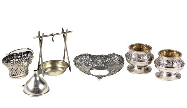 Collection (6) Miscellaneous American Sterling: Collection consisting of pair of embossed open salts, small gilt lined funnel, small tea strainer holder, Gorham reticulated heart-form ring dish, basket form tea ball.Please note that all sales are f