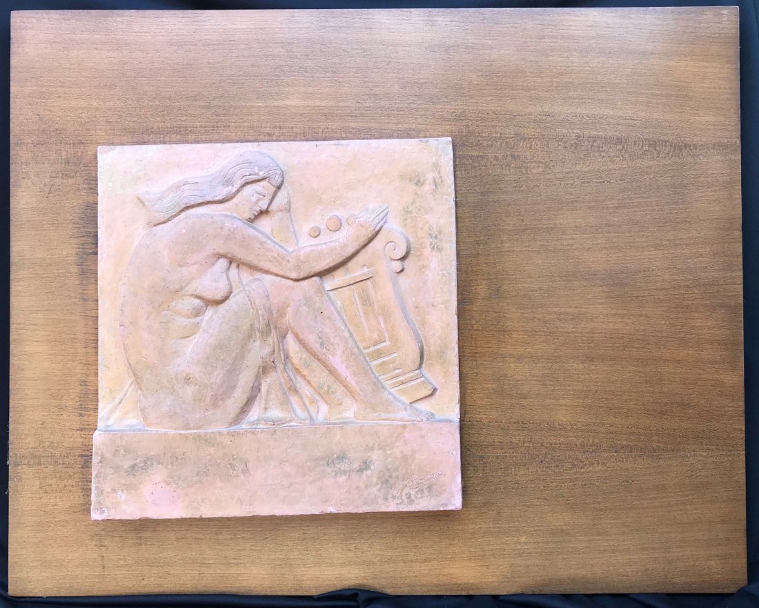 Art Deco Nude, Sculpture Mounted on Wood Panel: This is a marble carving of a nude woman holding a lyre by Rosa Pispieiro. It is signed in the lower right. Size: 27 1/2 x 34 in.Please note that all sales are final. No refunds will be given under an