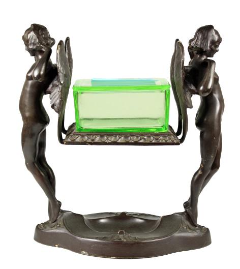 Rare Art Deco Glass Cigarette Box: This is a rare art deco possibly Frankart? green transparent glass cigarette box supported by to angels on each end. Size: 9 1/2 x 5 x 11 in. Please note that all sales are final. No refunds will be g