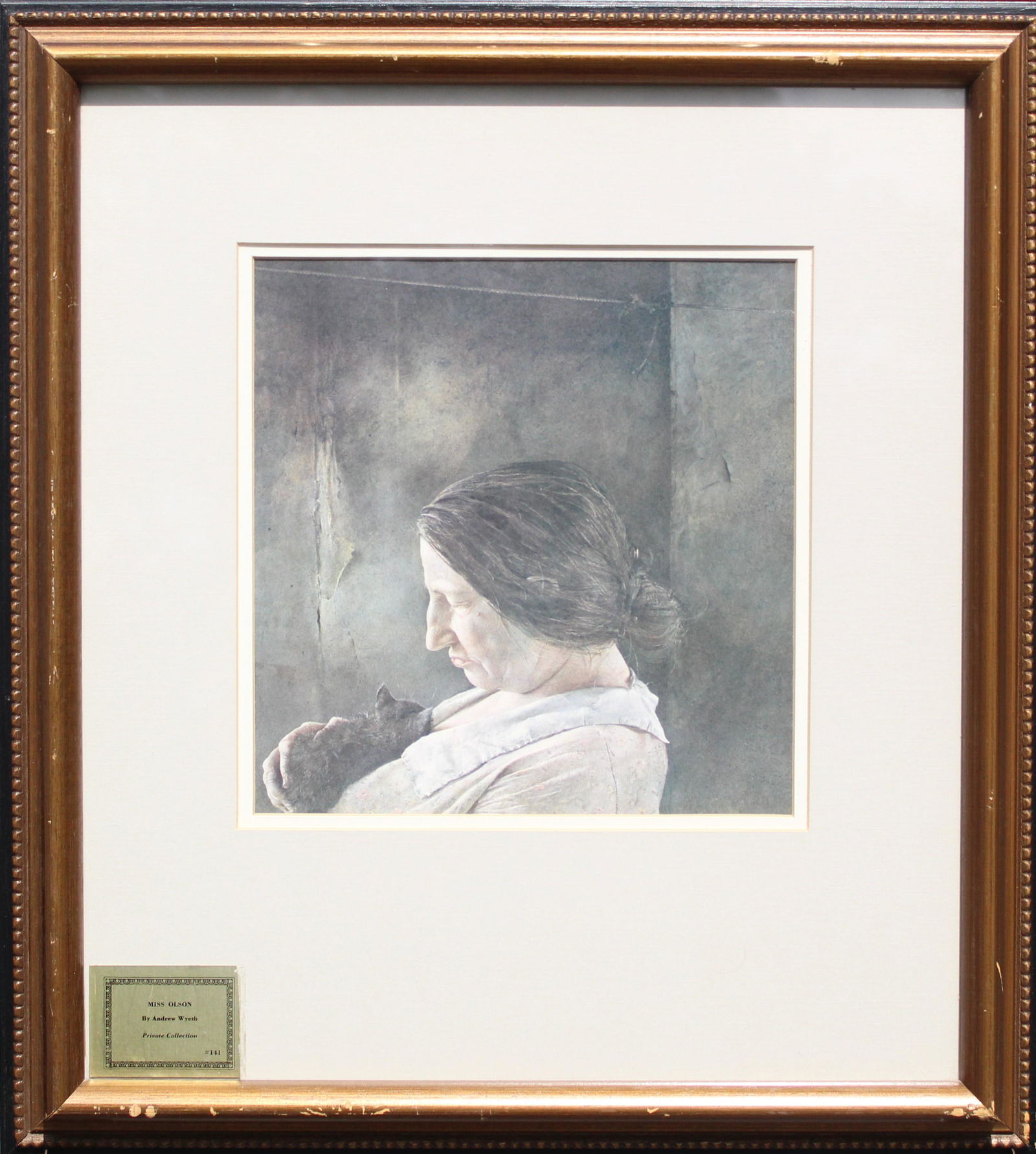 Andrew Newell Wyeth (1917-2009) "Miss Olson": American print by Andrew Wyeth, label in the lower left. It is titled Miss Olson, and is a side portrait of an elderly woman lovingly holding a cat on her chest. Overall size: 20 3/4 x 18 3/4 in.Sight