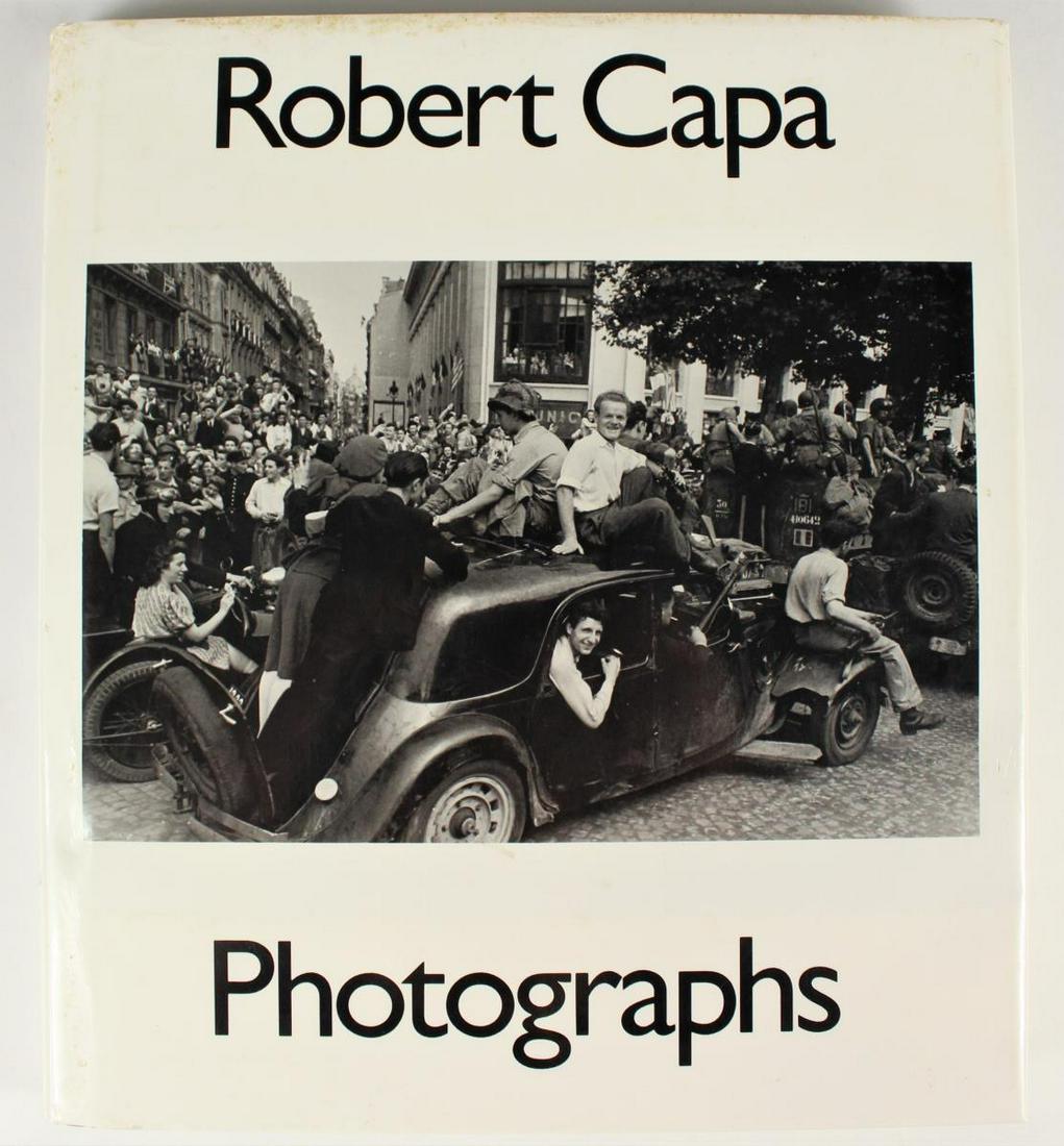 Book of Robert Capa Photographs: First edition/first printing (1985), book in good condition dust jacket has foxing. The first major collection of Robert Capa's photographs after twenty years, 262 images from the camera of one of the