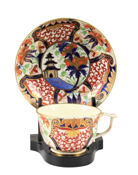 18th Century Derby Porcelain Cup & Saucer, c.1795: Set of cup and saucer from the London Shop, of circular form, decorated with roses and foliate motifs, in tones of green, pink and red, painted mark to base. AS is. Plate: 5 1/2 diameterCup: 2 x 4 in.