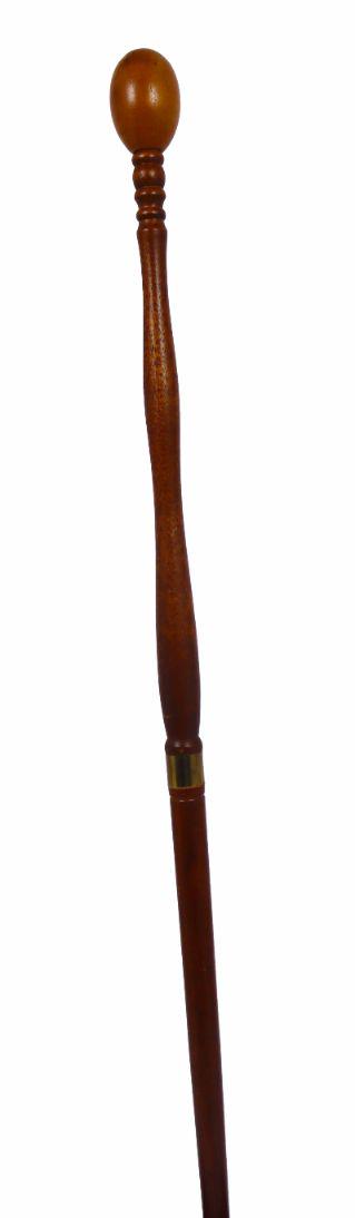 Turned Wood Walking Stick: This unique walking stick appears to be made from a turned table leg, it has an oval knob handle with metal trim and metal pointed tip.Overall length: 40 in.Please note that all sales are final. No re