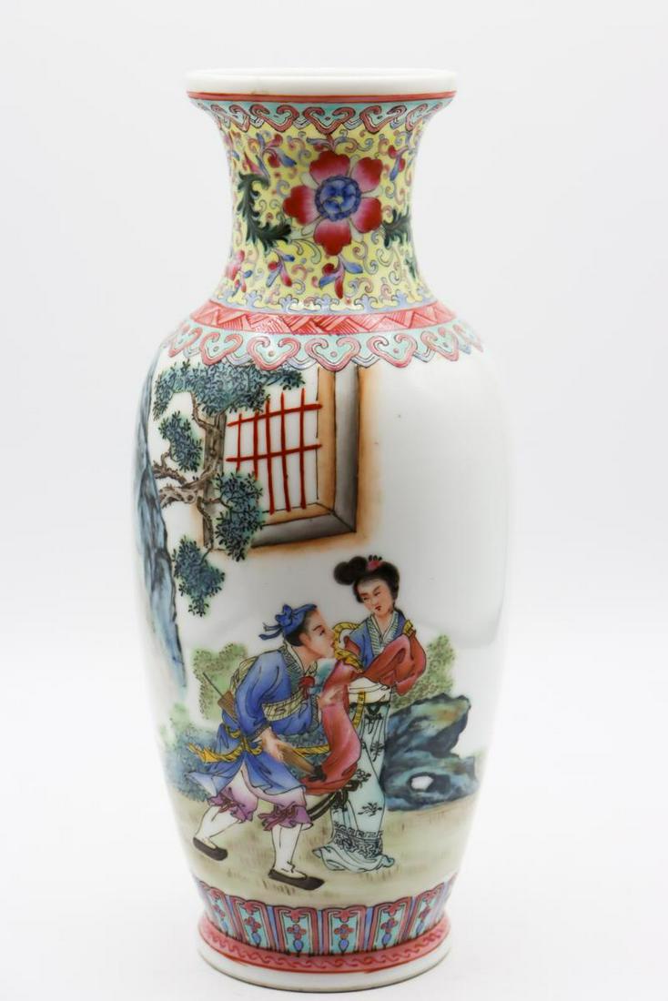 Chinese Famille Rose Figural Vase: Chinese vase with male and female figures, Qianlong marked base.Sizes: Vase - 9 1/2 x 4 1/2 in. Box - 7 x 15 1/2 x 7 1/2 in.