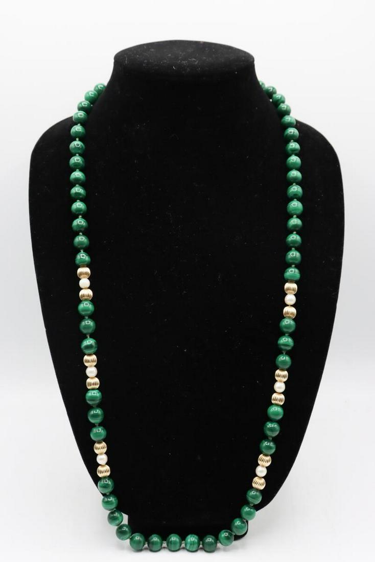 Malachite, Gold and Pearl Necklace: Green malachite beads of a uniform nature, interspersed with gold and pearl beads. 16 1/2 in.